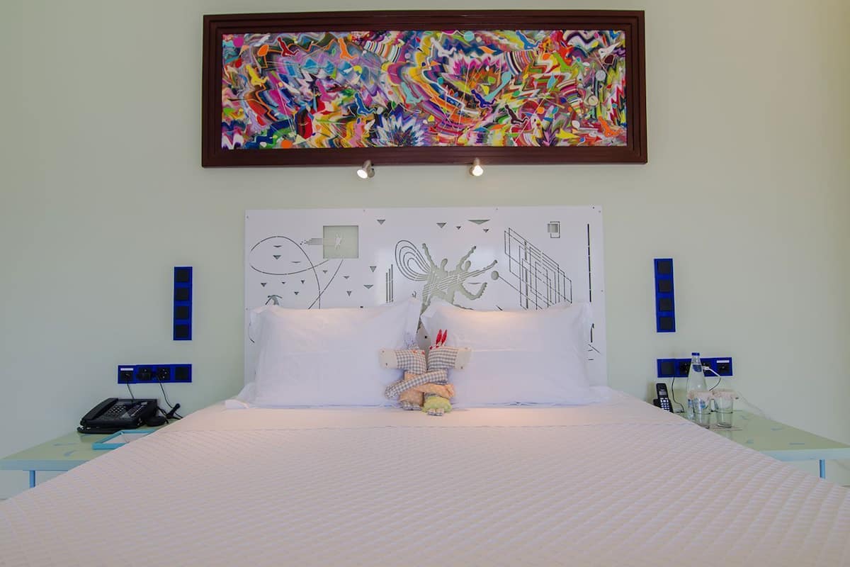 Senior Suite | Premium bedding, minibar, in-room safe, individually decorated