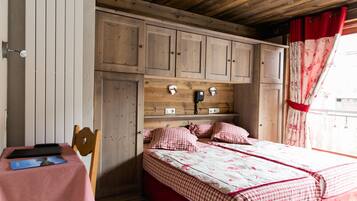 Cofres nos quartos, Wi-Fi de cortesia, roupa de cama