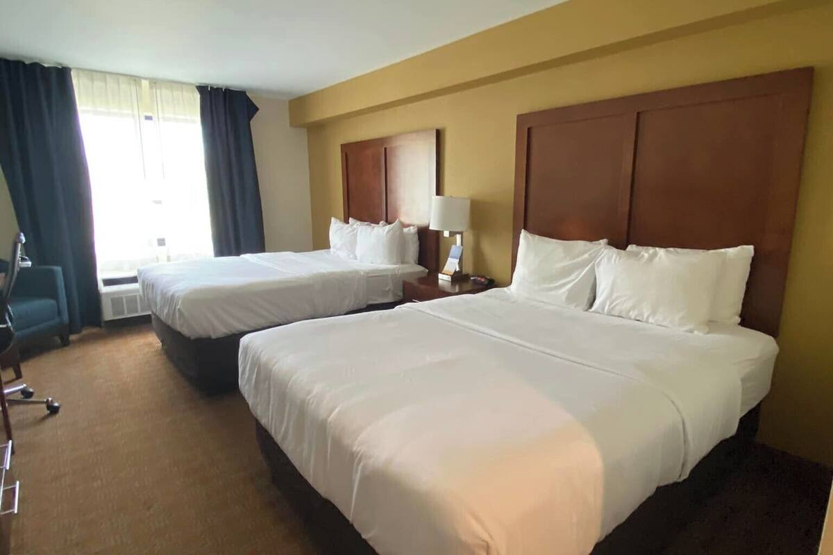 standard room, 2 queen beds, non smoking | desk, blackout curtains, iron/ironing board, free wifi