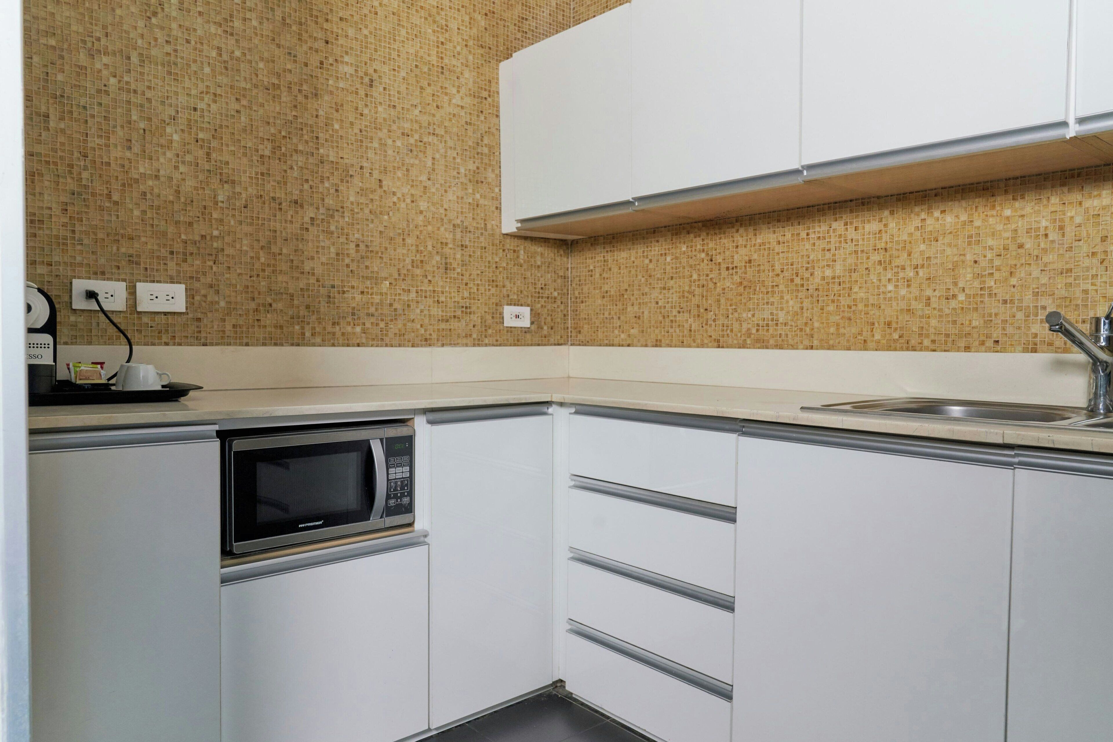 suite, 2 bedrooms, city view | in-room safe, desk, laptop workspace, blackout curtains