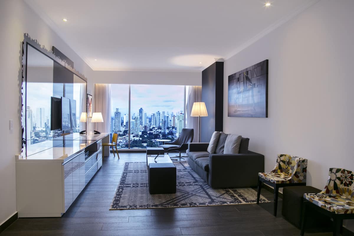 suite, 2 bedrooms, city view | in-room safe, desk, laptop workspace, blackout curtains