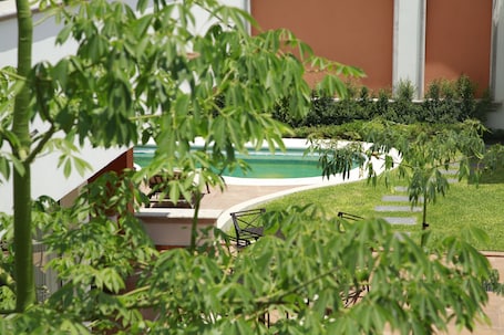 Outdoor pool, open 9:00 AM to 9:00 PM, sun loungers