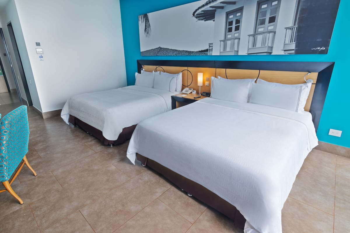 premium bedding, down duvets, minibar, in-room safe