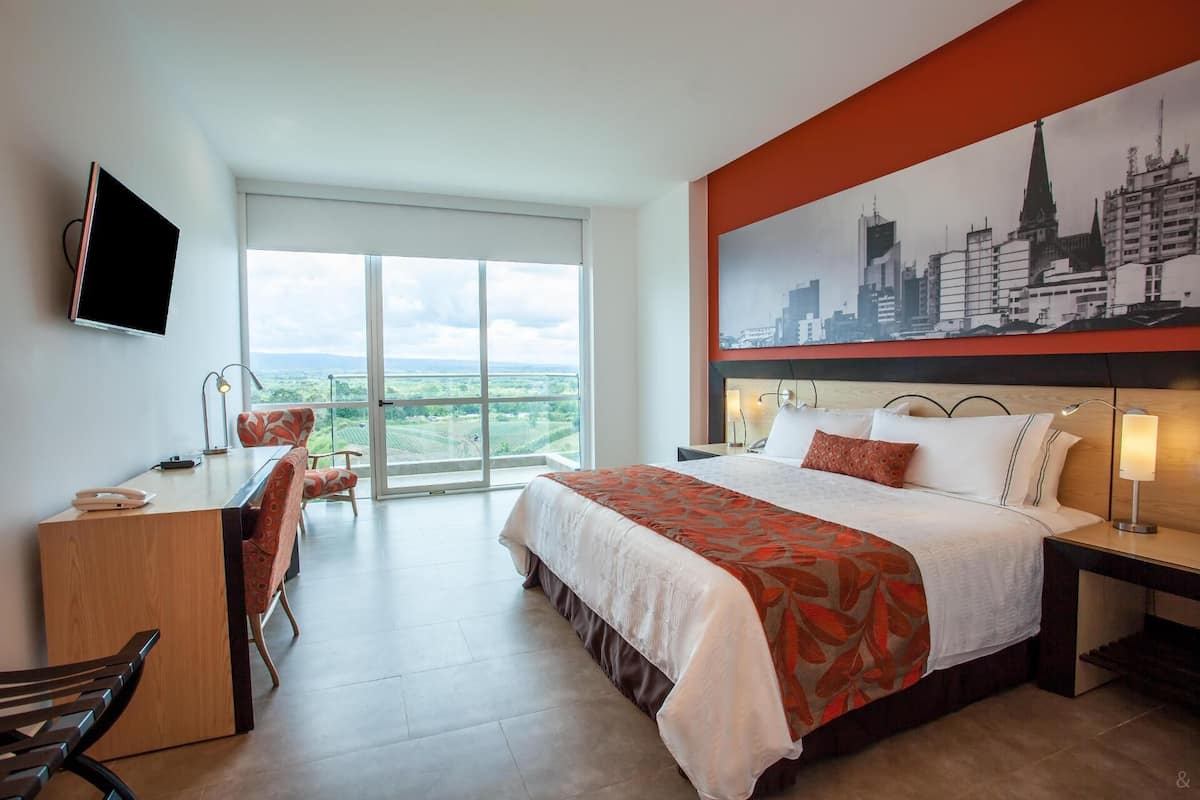 Premium bedding, down comforters, minibar, in-room safe
