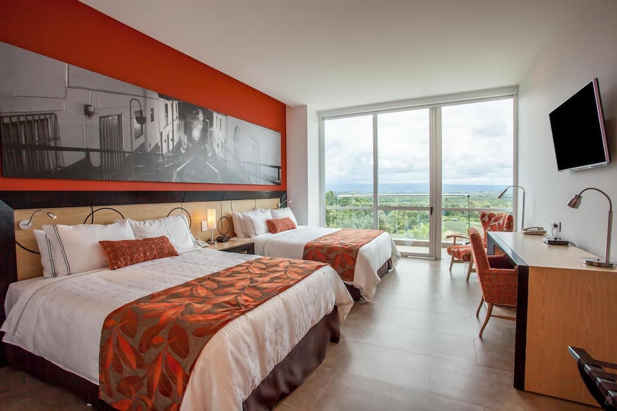 Premium bedding, down comforters, minibar, in-room safe