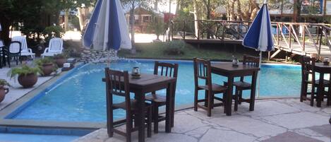 Indoor pool, outdoor pool, pool umbrellas, sun loungers