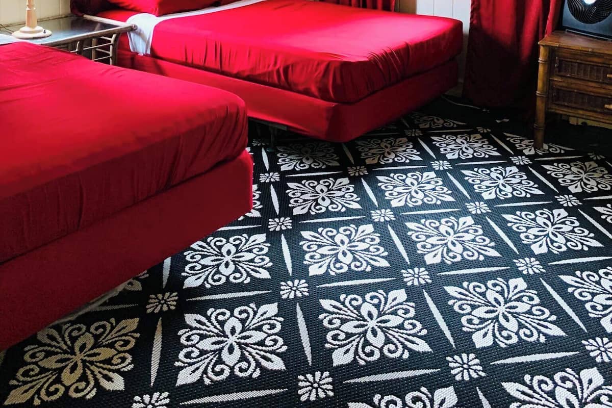 Familie suite, uitzicht op oceaan | 1 slaapkamer, gratis extra bedden, beddengoed