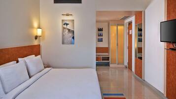 Ropa de cama de alta calidad y minibar