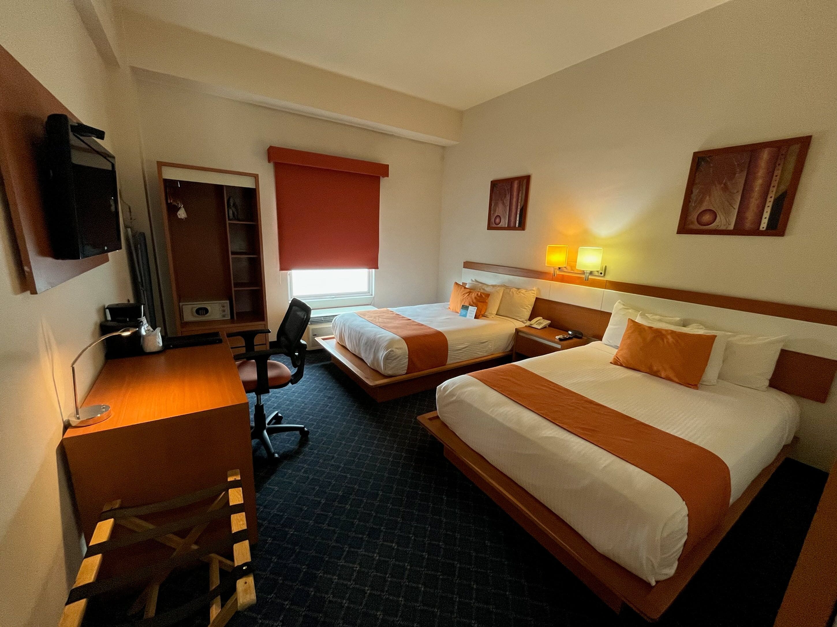 standard double room, 2 double beds | in-room safe, desk, laptop workspace, iron/ironing board