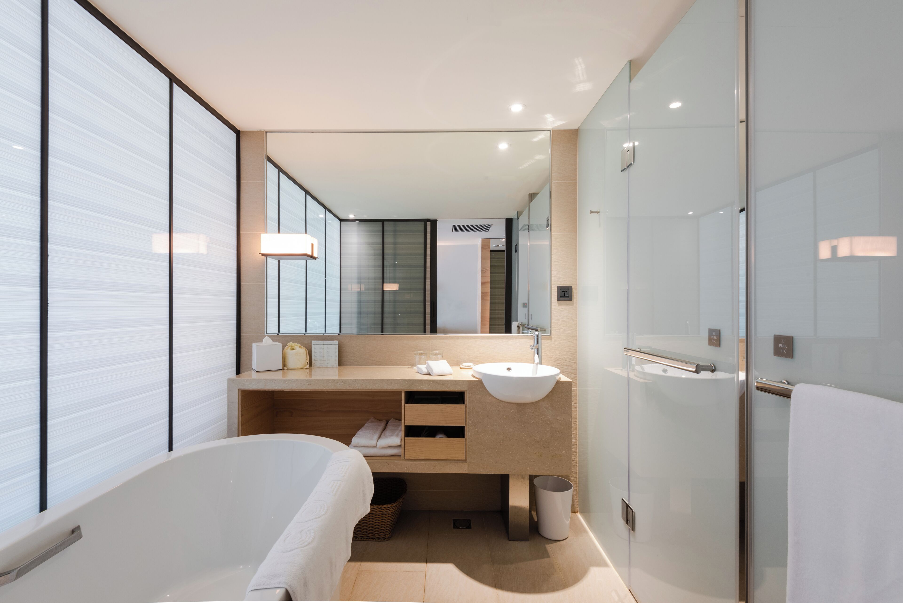 Separate tub and shower, deep soaking tub, eco-friendly toiletries