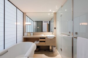 Separate tub and shower, deep soaking tub, eco-friendly toiletries