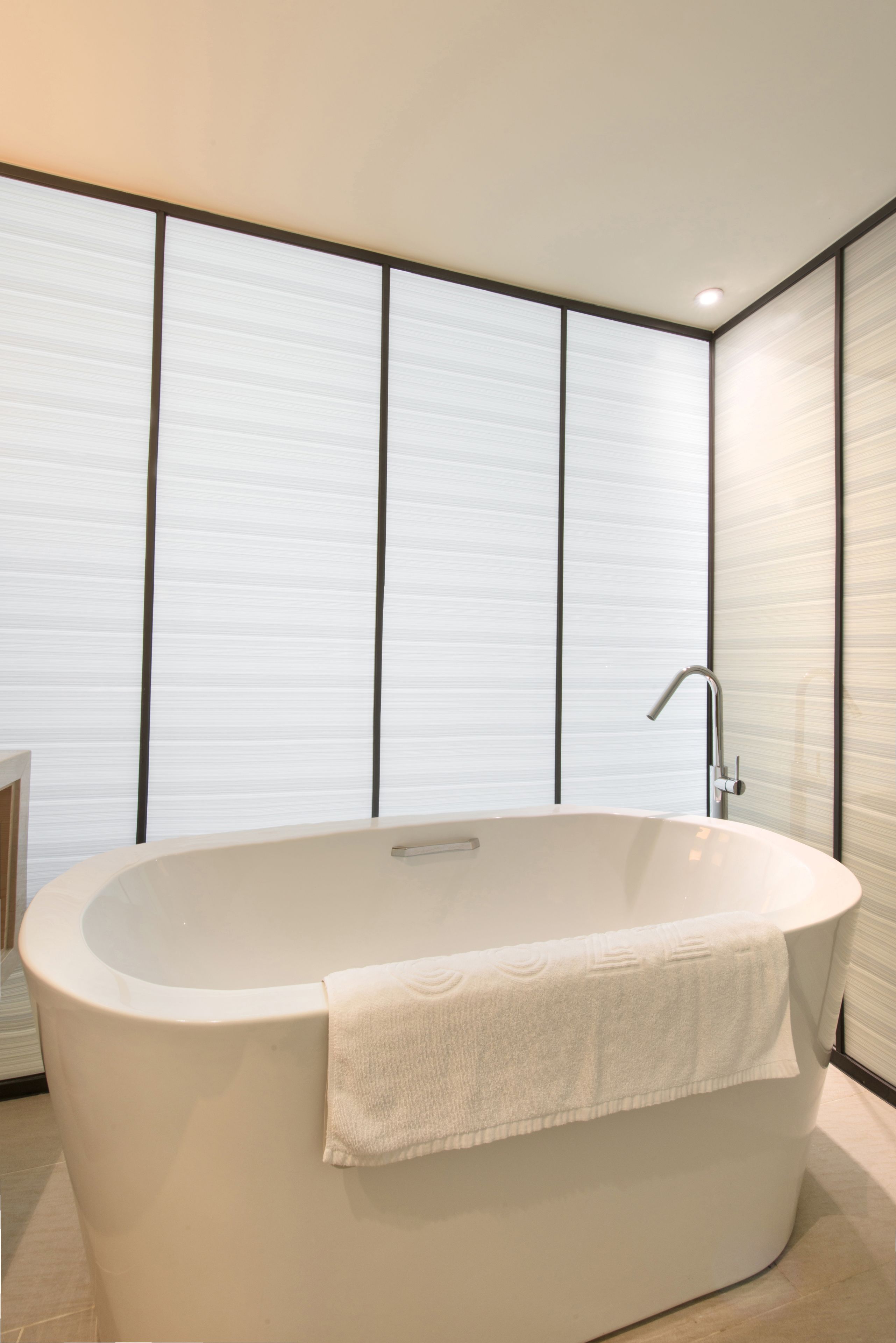 separate bathtub and shower, deep-soaking bathtub