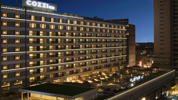 A multi-story hotel with a prominent sign reading "COZZI". - HOTEL COZZI Ximen Tainan (Tainan)
