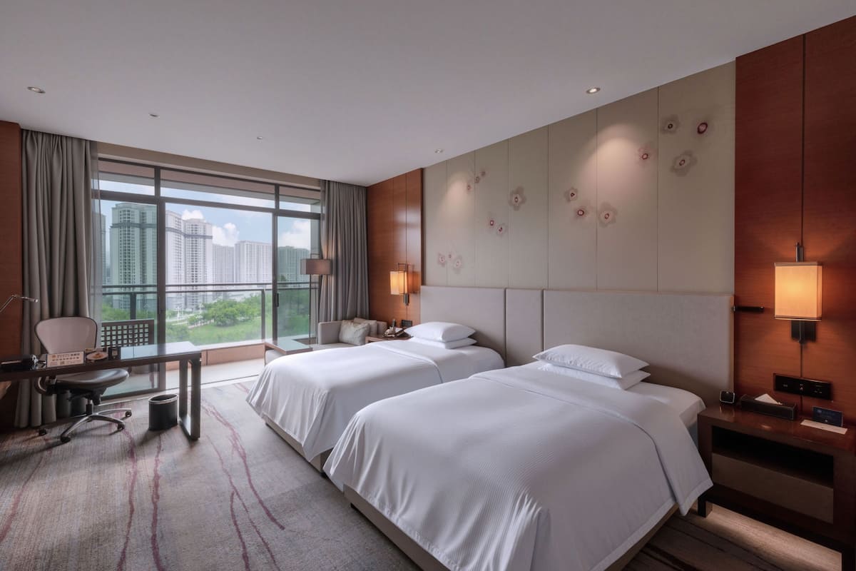 Chambre Deluxe avec lits jumeaux, vue sur le lac | Literie de qualité, minibar, coffre-fort, fer et planche à repasser