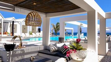 Outdoor pool, open 8 AM to 11:00 PM, free cabanas, pool umbrellas