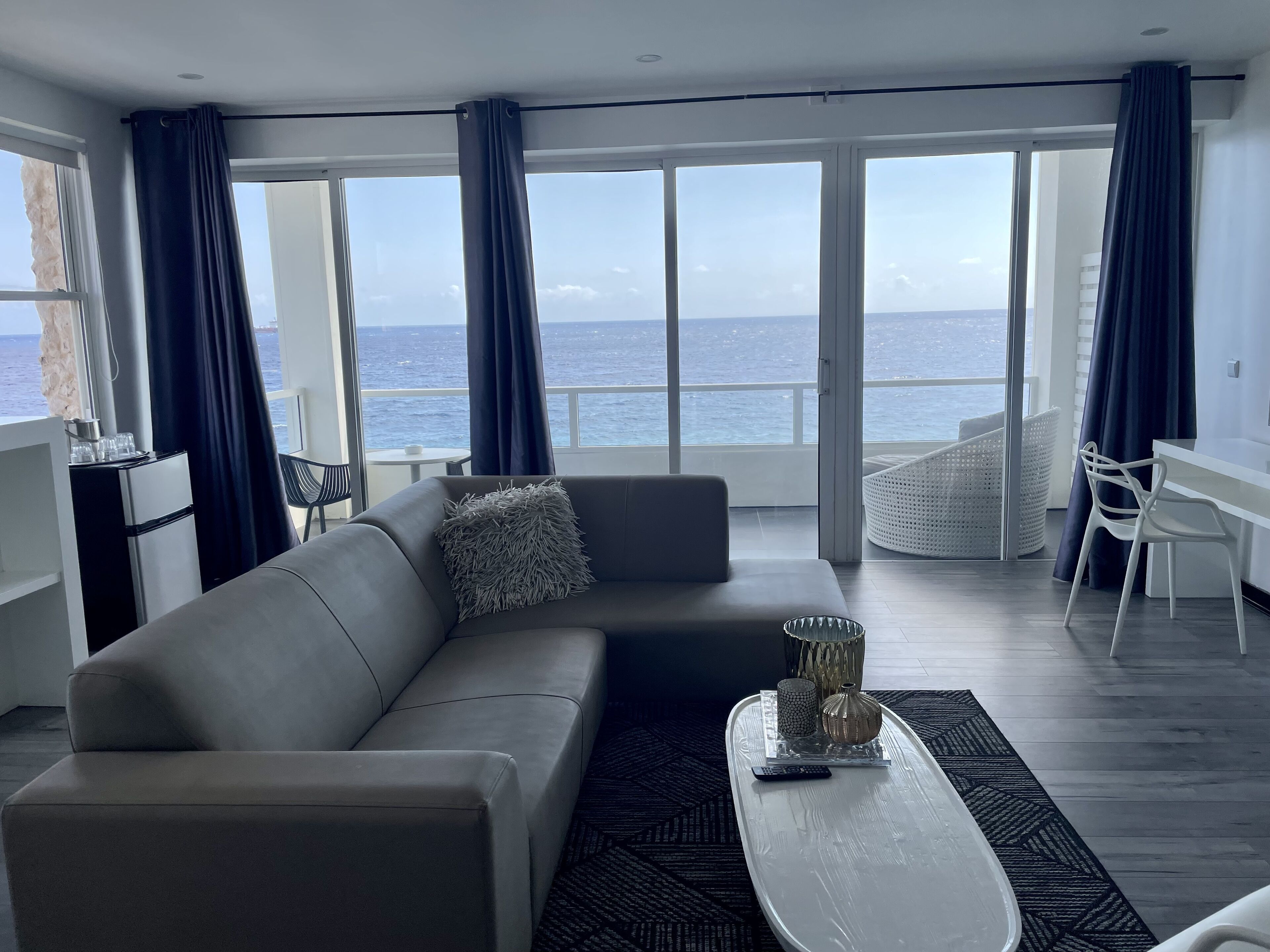 junior suite, oceanfront | minibar, in-room safe, iron/ironing board, free wifi