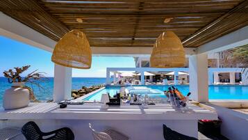 Outdoor pool, open 8 AM to 11:00 PM, free pool cabanas, pool umbrellas
