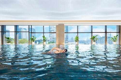 Indoor pool, open 6:00 AM to 11:00 PM, lifeguards on site