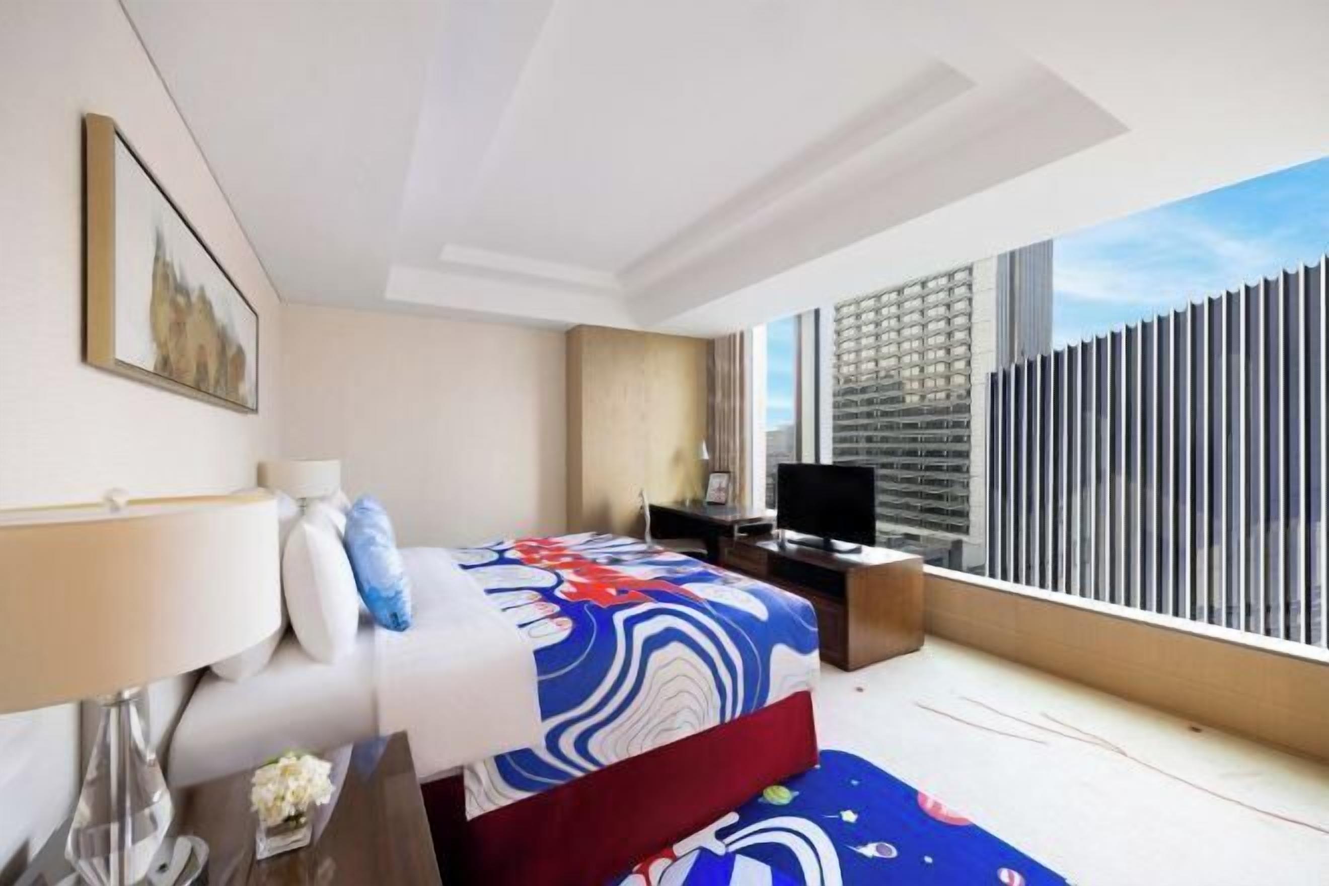 Roba de llit d'alta qualitat, minibar i caixa forta a l'habitació 