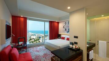 Premium bedding, down duvets, pillow-top beds, in-room safe