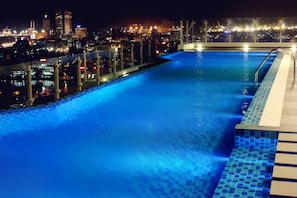 Outdoor pool, open 7:00 AM to 9:00 PM, sun loungers