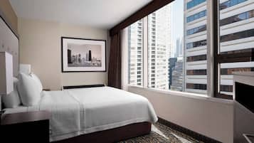 Premium bedding, down comforters, in-room safe, desk