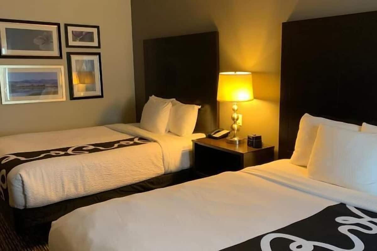 Premium bedding, desk, iron/ironing board, free cribs/infant beds