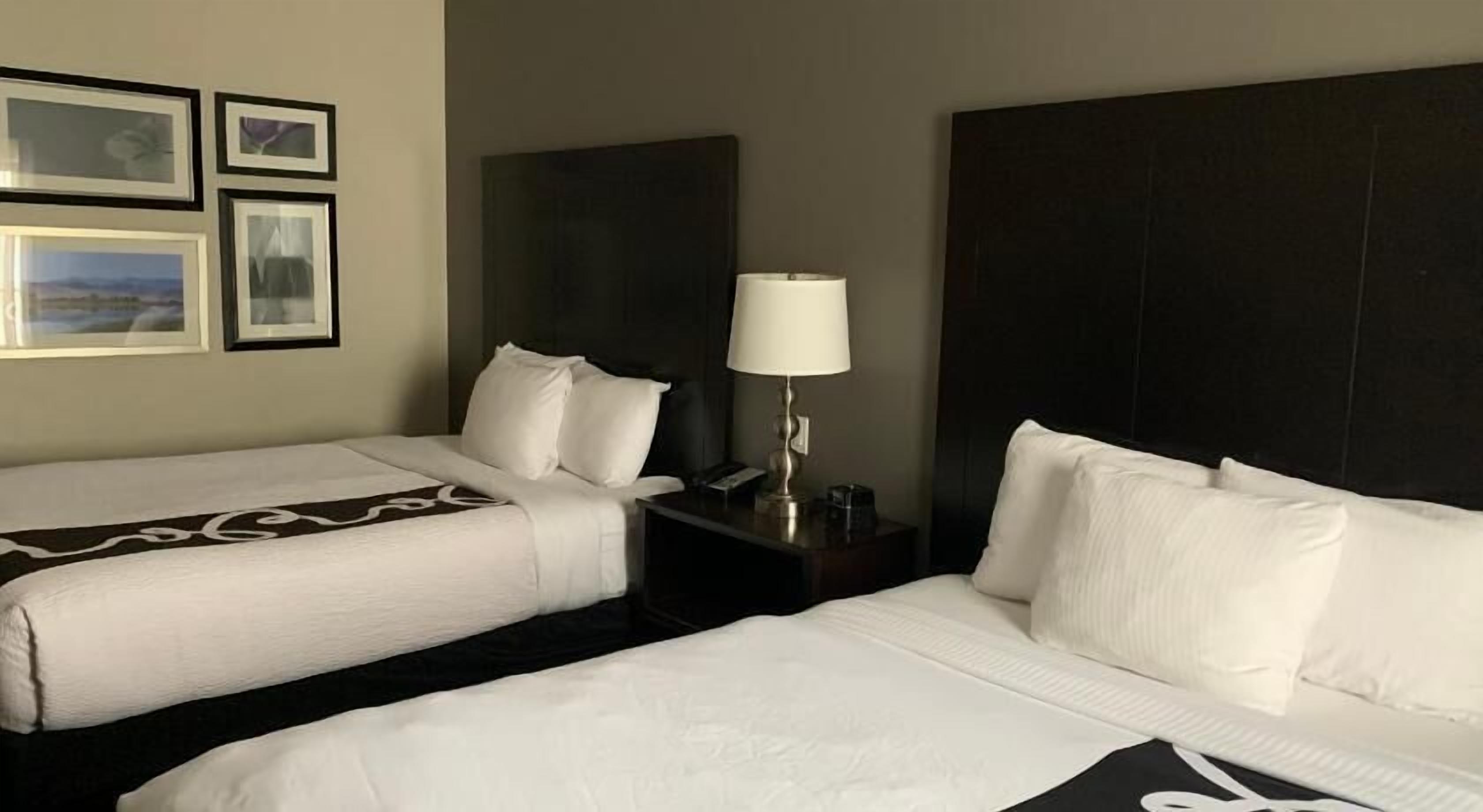 Premium bedding, desk, iron/ironing board, free cribs/infant beds