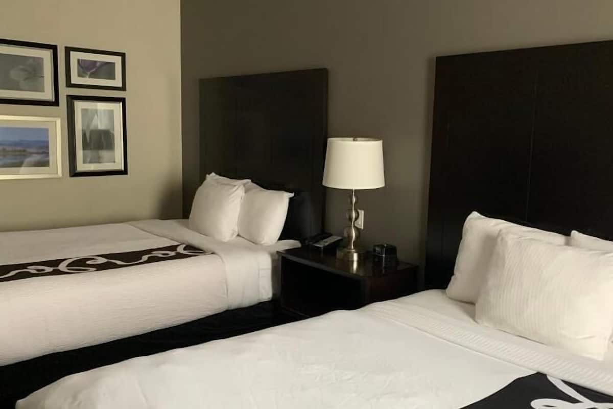 Premium bedding, desk, iron/ironing board, free cribs/infant beds