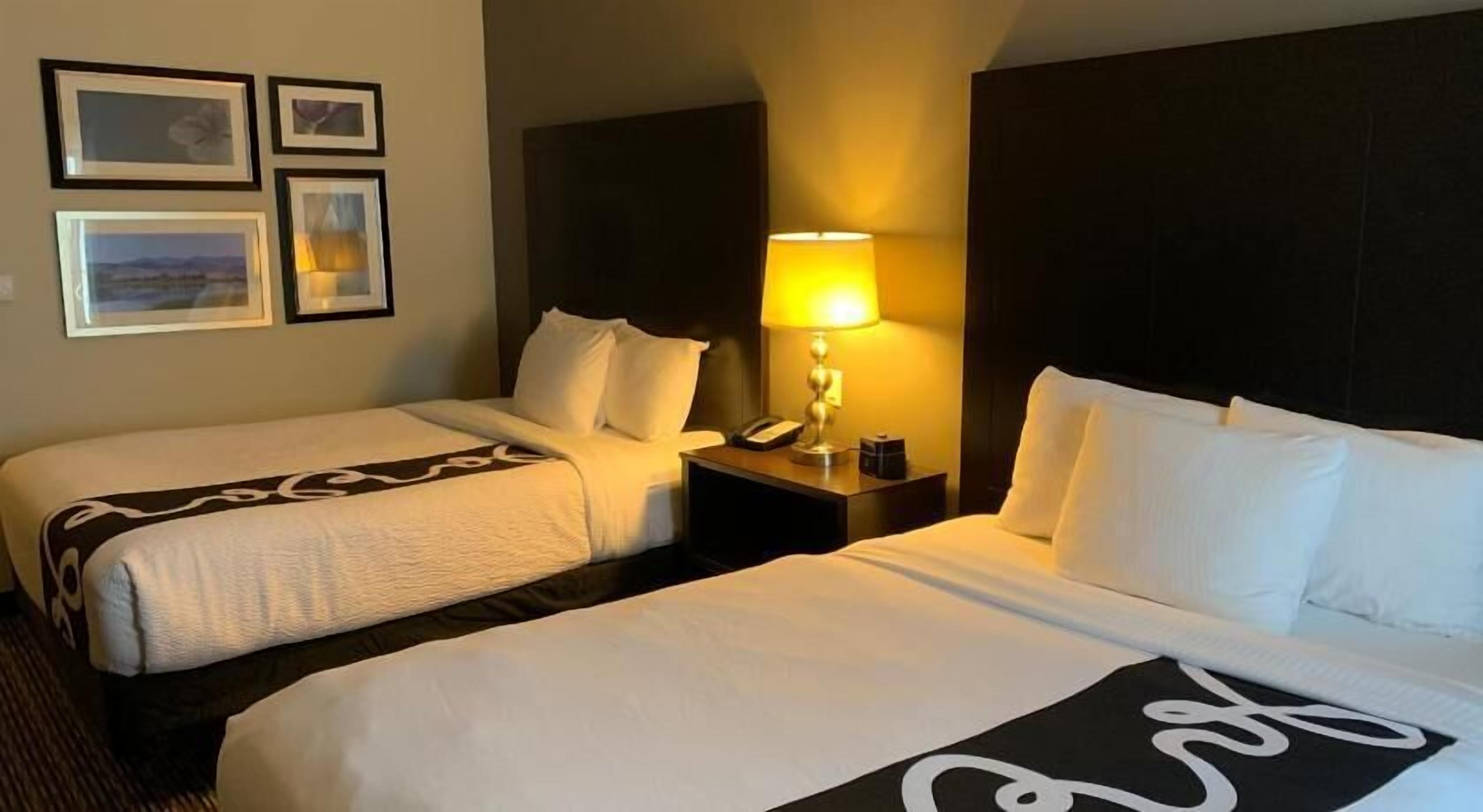 Premium bedding, desk, iron/ironing board, free cribs/infant beds