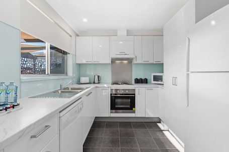 Three Bedroom Cottage | Private kitchen | Fridge, coffee/tea maker, electric kettle