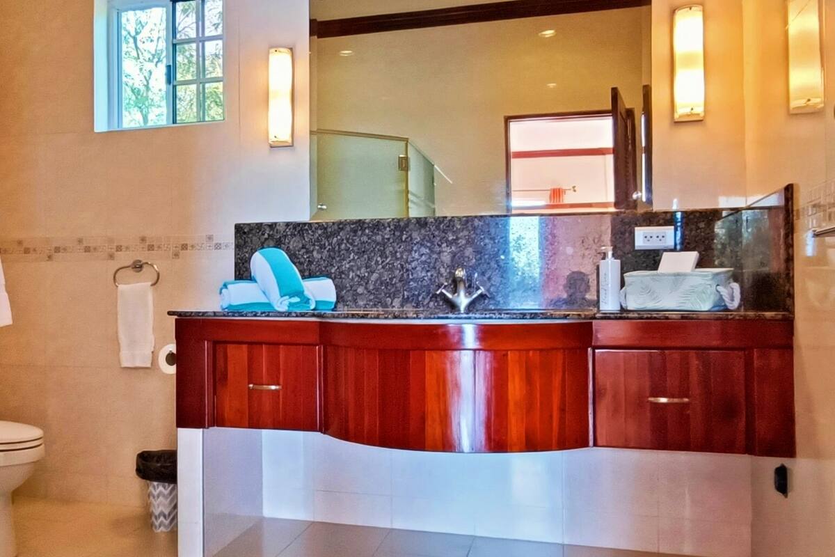 deluxe suite, 2 queen beds, sea view | bathroom | shower, rainfall showerhead, free toiletries, hair dryer