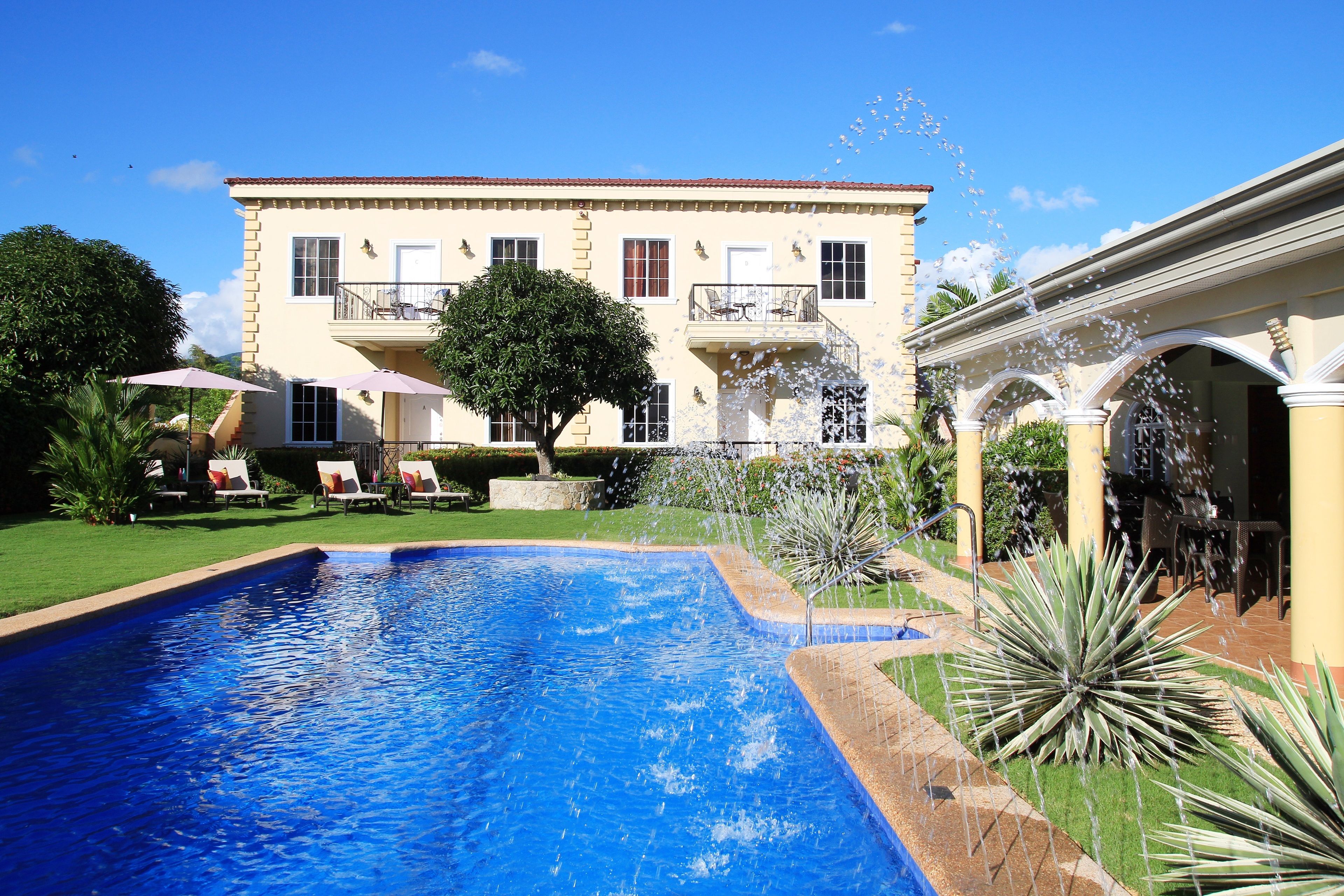 outdoor pool, open 8:00 am to 8:00 pm, pool loungers