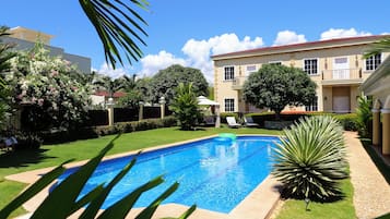 Outdoor pool, open 8:00 AM to 8:00 PM, sun loungers