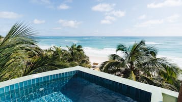 Habitación Deluxe, 1 cama King size, alberca privada, vista al océano | Vista a la playa o el mar