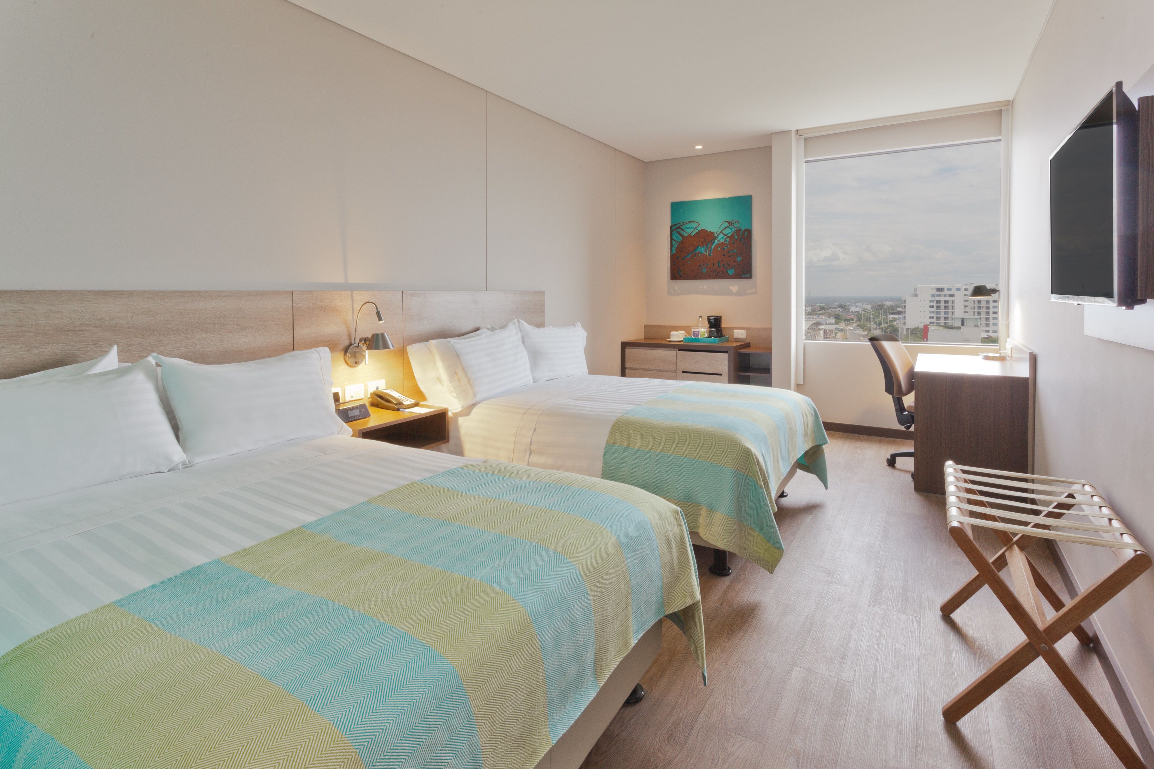 standard room, 2 double beds | minibar, in-room safe, desk, iron/ironing board