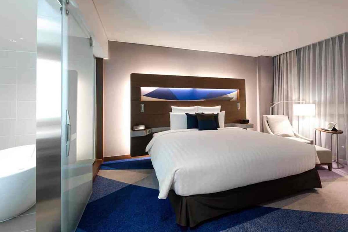 Executive Suite, 1 King Bed | 1 bedroom, down comforters, minibar, in-room safe