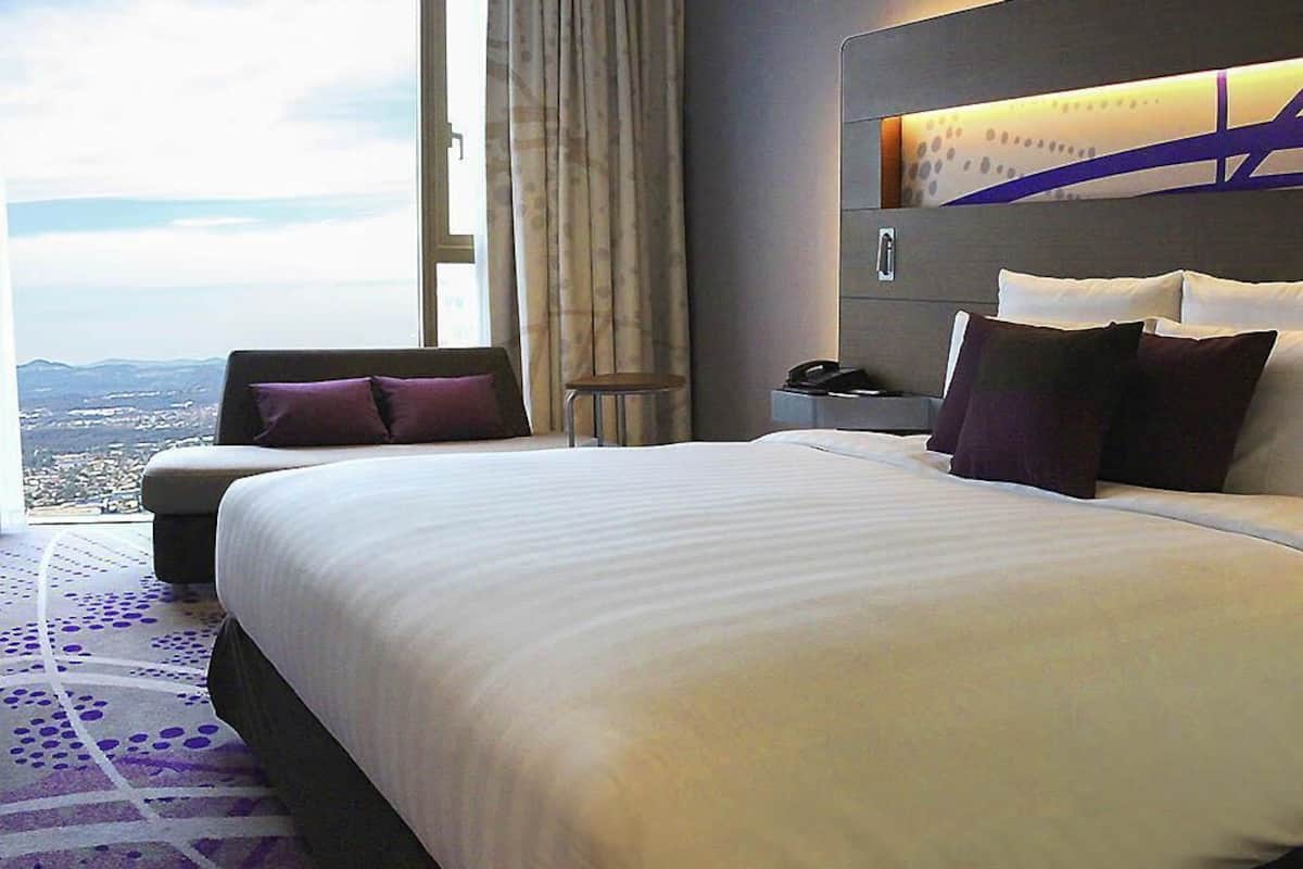 Deluxe Room, 1 King Bed | 1 bedroom, down comforters, minibar, in-room safe