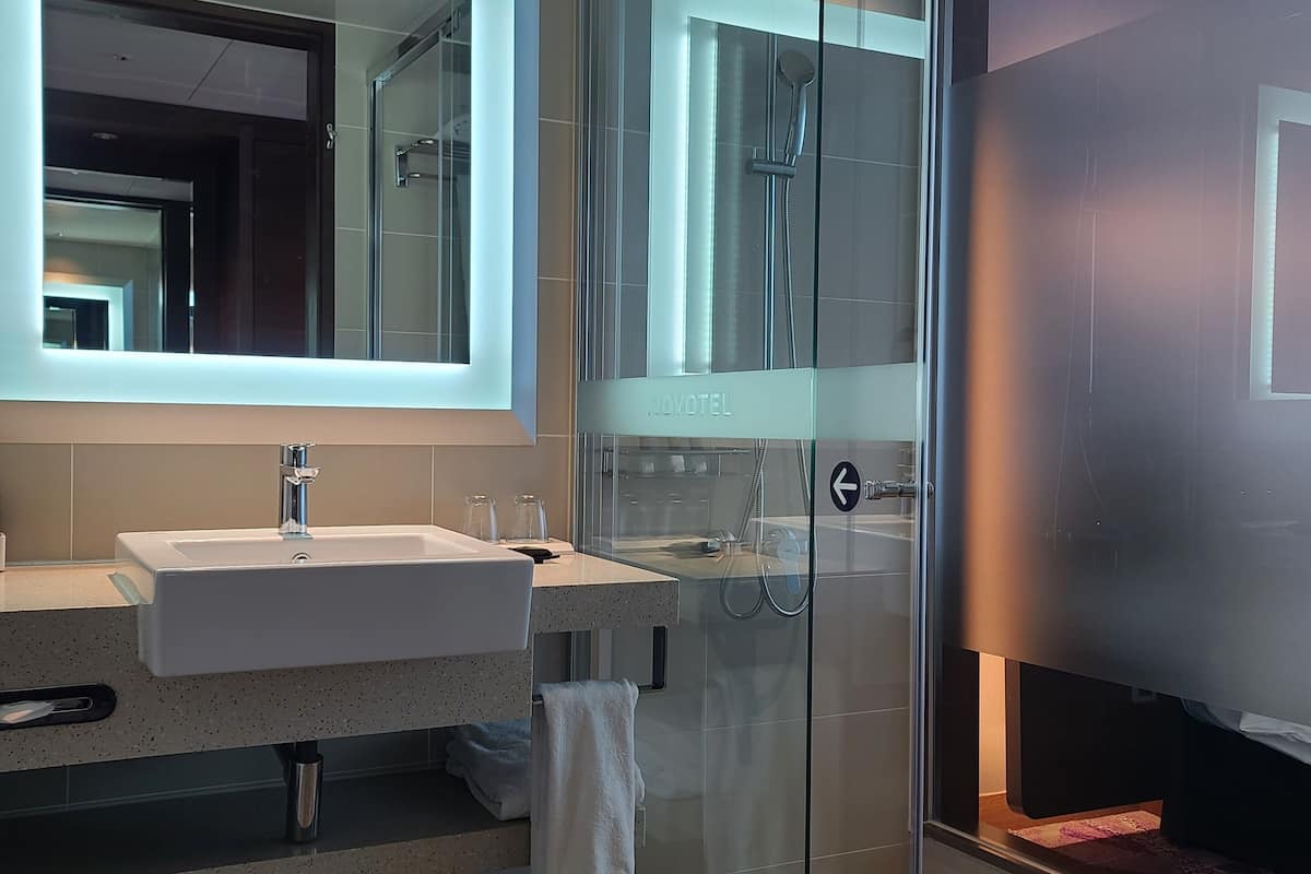 eco-friendly toiletries, hair dryer, bathrobes, slippers