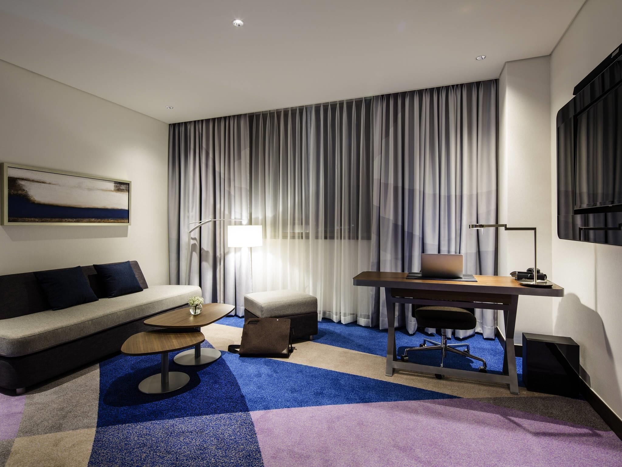 Junior Suite, 1 King Bed | Down comforters, minibar, in-room safe, desk