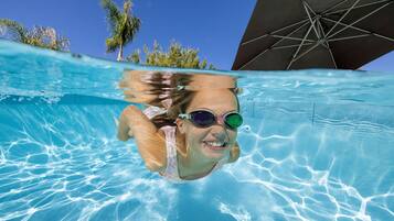 2 outdoor pools, pool umbrellas, pool loungers