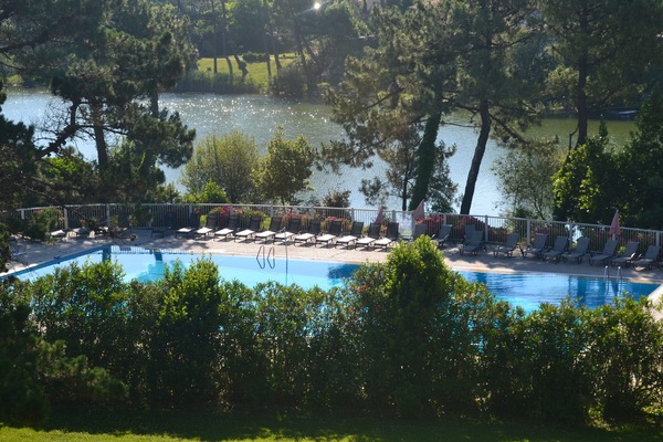 Indoor pool, outdoor pool, pool umbrellas, sun loungers