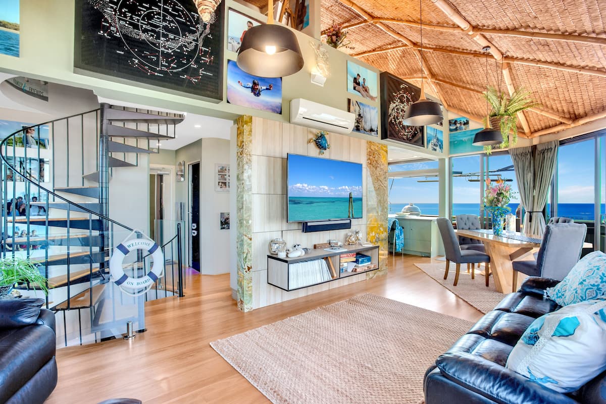 Panoramic Loft | Living area | 1-cm flat-screen TV with cable channels, TV, DVD player