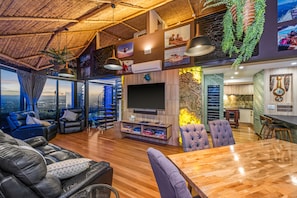 Panoramic Loft | Living area | 1-cm flat-screen TV with cable channels, TV, DVD player