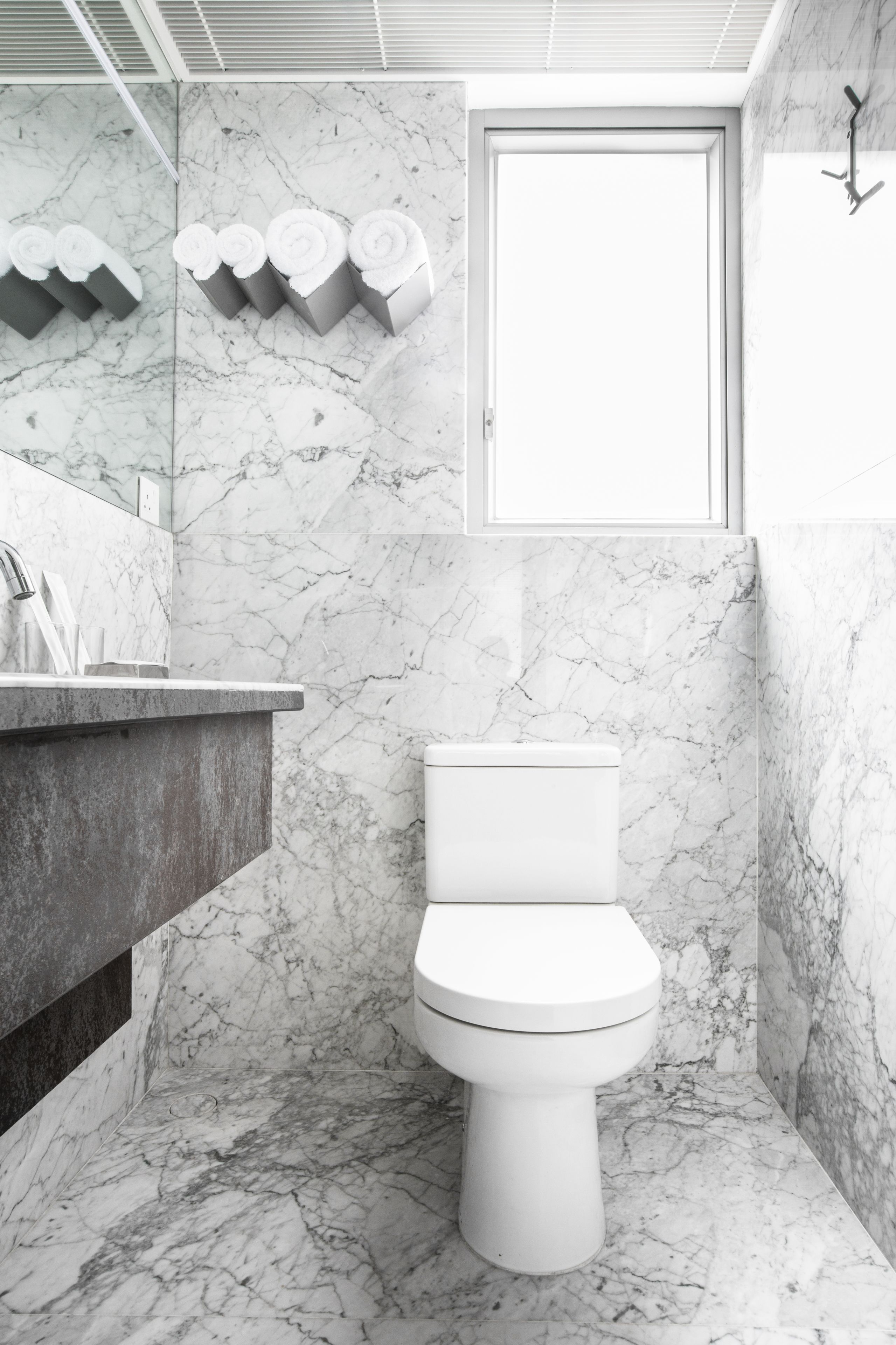 shower, designer toiletries, hair dryer, slippers