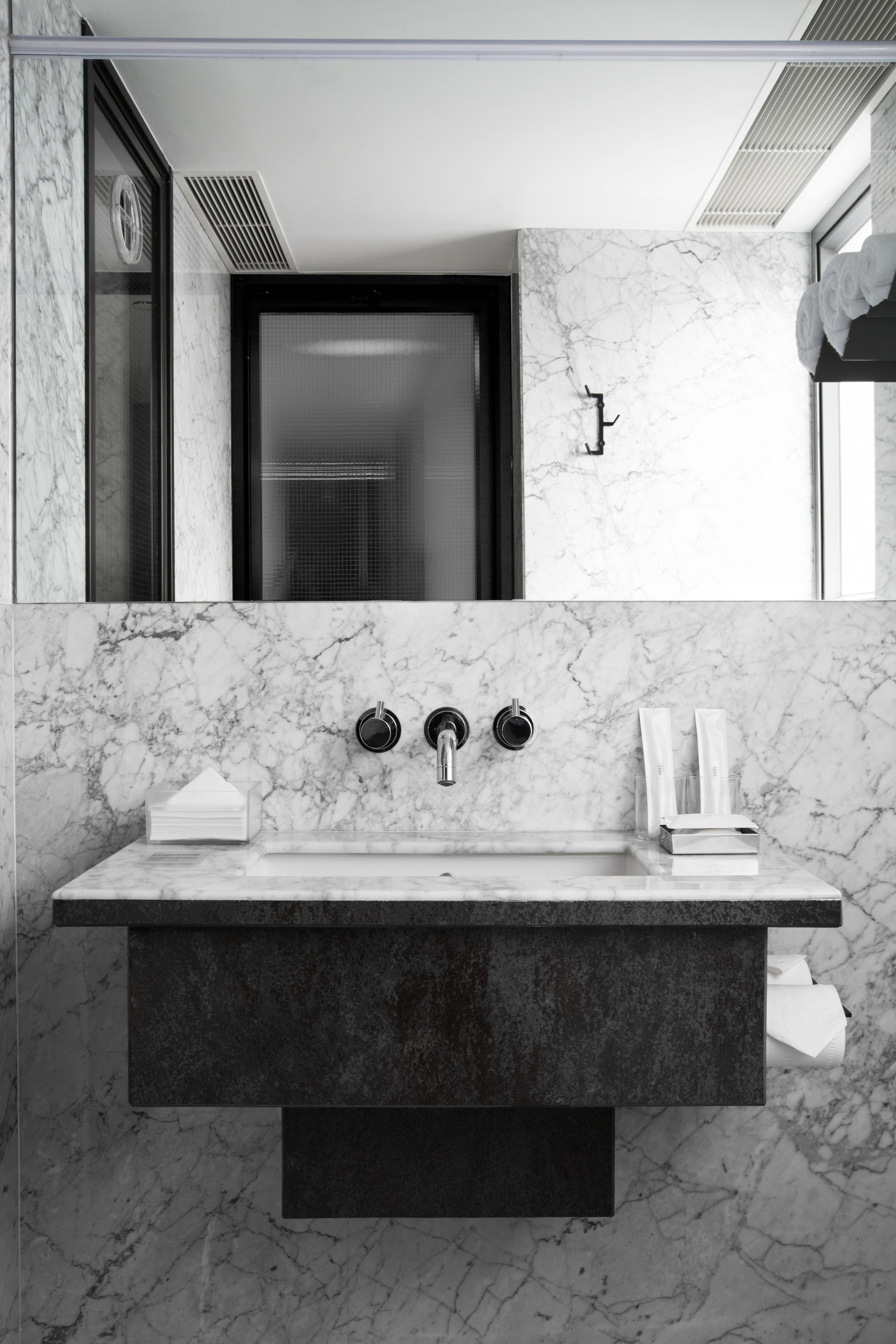 shower, designer toiletries, hair dryer, slippers