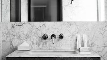 Shower, designer toiletries, hair dryer, slippers