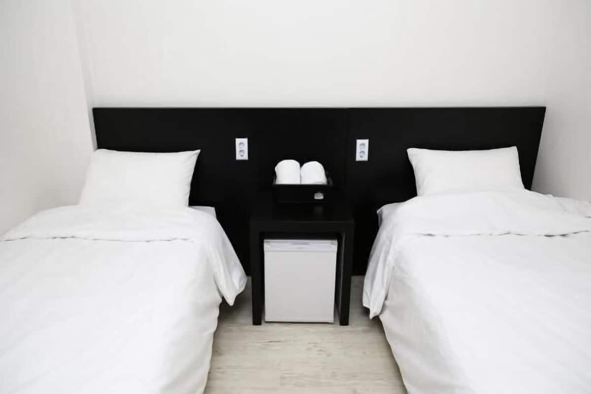 Blackout curtains, iron/ironing board, free WiFi, bed sheets