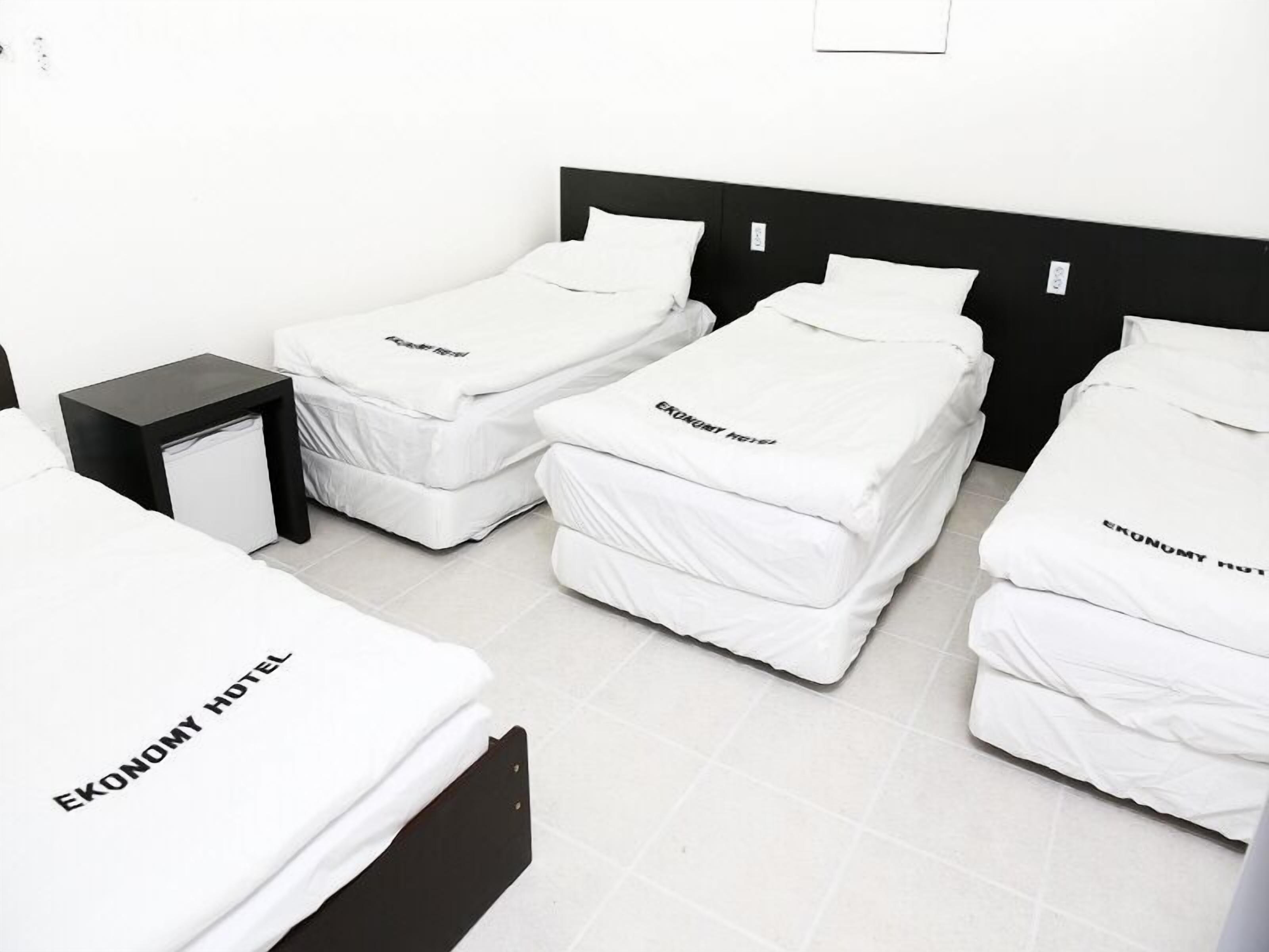 Shared Dormitory, Women only (4 Person) | Blackout drapes, iron/ironing board, free WiFi, bed sheets