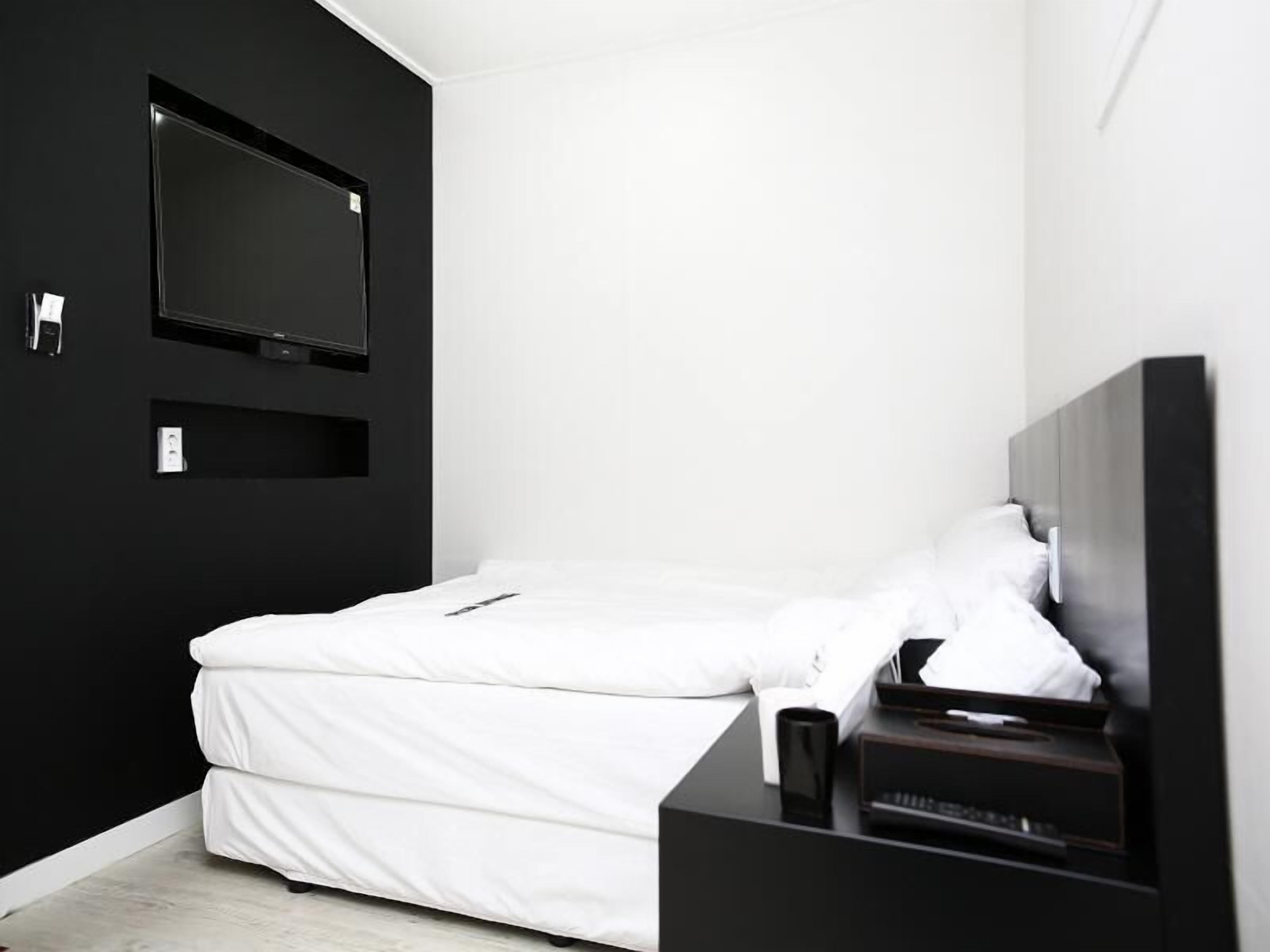 Blackout curtains, iron/ironing board, free WiFi, bed sheets